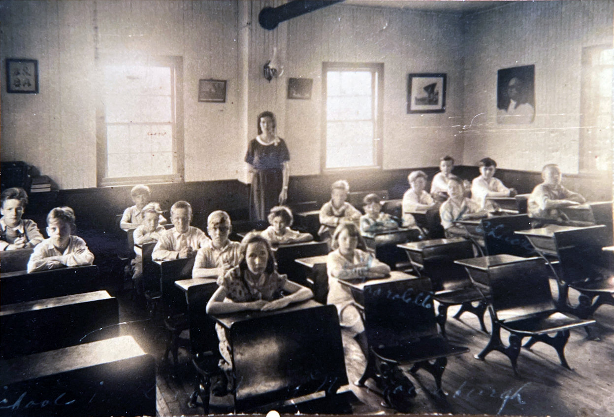 Children in the historic Lava School House.
